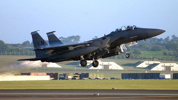 ROYAL AIR FORCE LAKENHEATH, England -- A 494th Fighter Squadron F-15E Strike Eagle takes to the sky en route to a deployment supporting Operation Iraqi Freedom, July 14. (U.S. Air Force photo by Staff Sgt. William Greer)