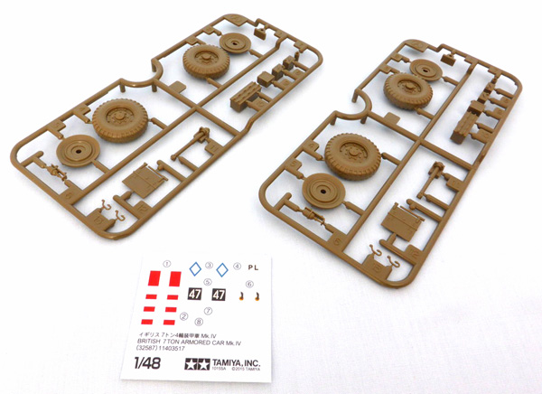 Two identical sprues with the running gear and decals. 